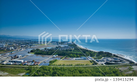 五月、田植えの季節の黒部川河口周辺から見た風景 五月、田植えの季節の黒部川河口周辺から見た風景 139413294