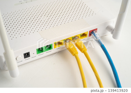 Ethernet cable with wireless router connect to internet service provider network. 139413920