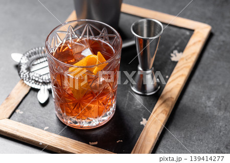 Old Fashioned Cocktail with Orange Peel on black background 139414277