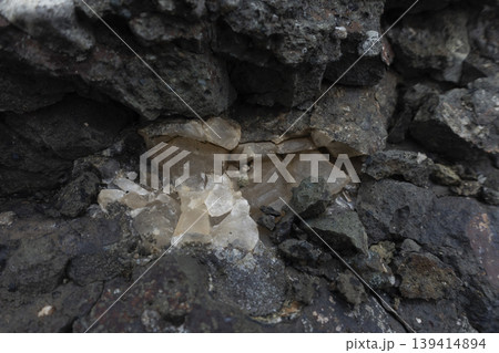 Calcite crystals inside rock cavity close up Calcite crystals inside rock cavity close up 139414894