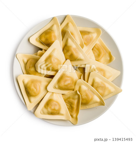 Triangular Ravioli Pasta On White Plate - Fresh Italian Uncooked Dumplings For Cooking Triangular Ravioli Pasta On White Plate - Fresh Italian Uncooked Dumplings For Cooking 139415493
