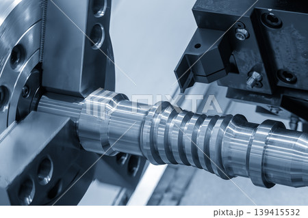 High precision production process of a lead ball screw shaft using a CNC lathe machine in a blue-toned industrial scene. 139415532