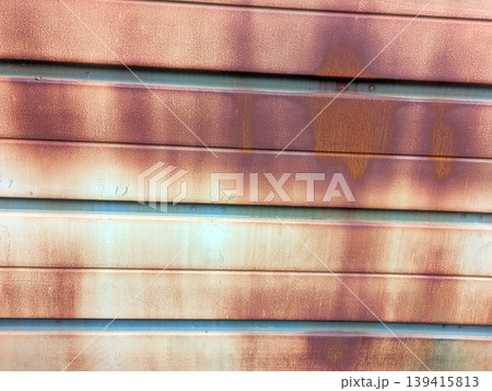 Lined rusted and painted weathered metal background patina 139415813