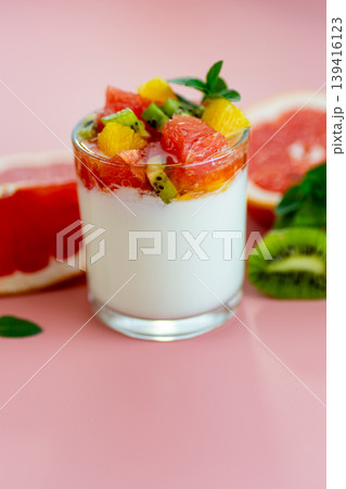 healthy eating concept with yogurt fruit bowl and fresh citrus arrangement healthy eating concept with yogurt fruit bowl and fresh citrus arrangement 139416123