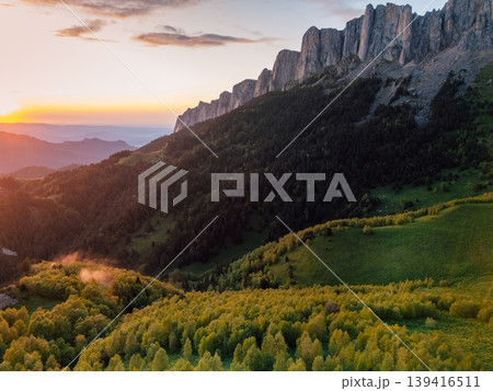Above drone view of national park Bolshoy Tkhach mountain in Caucasus with sunset sunlight Above drone view of national park Bolshoy Tkhach mountain in Caucasus with sunset sunlight 139416511
