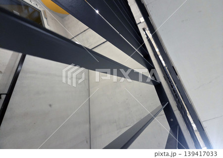 Modern Architectural Design Featuring Stylish Metal Railings in a Contemporary Interior Modern Architectural Design Featuring Stylish Metal Railings in a Contemporary Interior 139417033