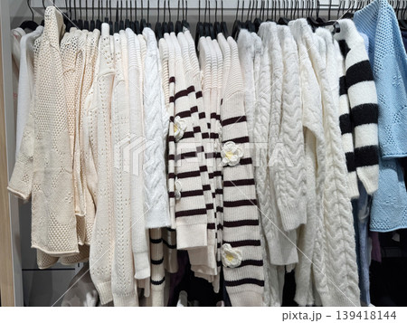 White sweaters rack minimal knit fashion clothing store soft cozy collection White sweaters rack minimal knit fashion clothing store soft cozy collection 139418144