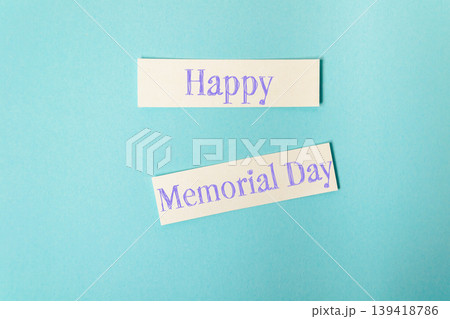 Happy Memorial Day greeting card design with colorful text on a blue background Happy Memorial Day greeting card design with colorful text on a blue background 139418786