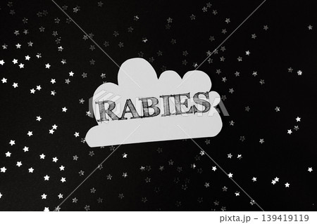 Black and white image of a starry sky with the word Rabies written in white 139419119