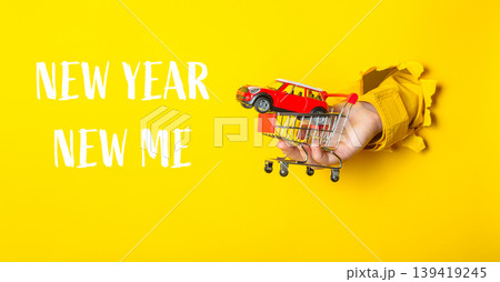 a shopping cart with the words New Year, New Me written below a shopping cart with the words New Year, New Me written below 139419245