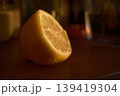 close up of lemon slices in a glass on wooden table 139419304