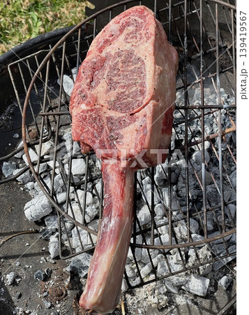 Txuleton Beef Steak on Grill with Juicy Texture Txuleton Beef Steak on Grill with Juicy Texture 139419567