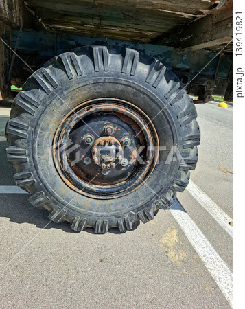 VORONEZH, Russia - April 25, 2026.Large heavy duty off road tire from vintage Soviet military truck shows rugged design and tread suitable for tough terrain in outdoor setting 139419821