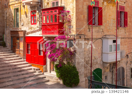 Narrow historic street with traditional balconies in Valletta Malta 139421146