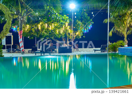 swimming pool on the beach against the background of the sea of one of the hotels at night on the Long beach of Koh Rong Island, Cambodia 139421661