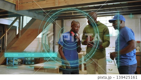 Gesturing instructor guiding apprentices in woodworking shop, with tape measure and HUD overlay 139425161