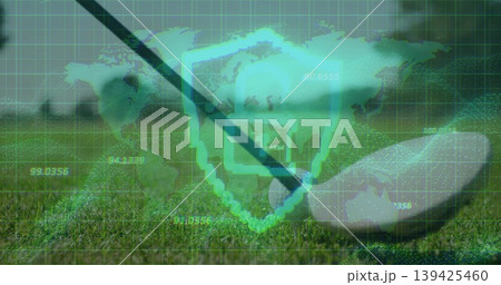 Showing golf club head hitting ball on trimmed grass, with shield, map, grid and numeric overlays 139425460