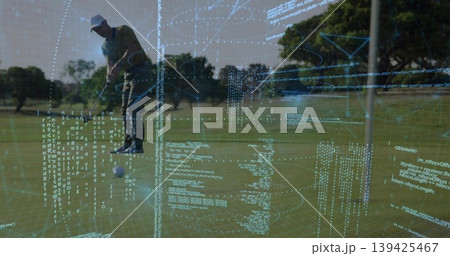 Leaning golfer in cap striking golf ball on fairway, with putter and code projections, copy space 139425467
