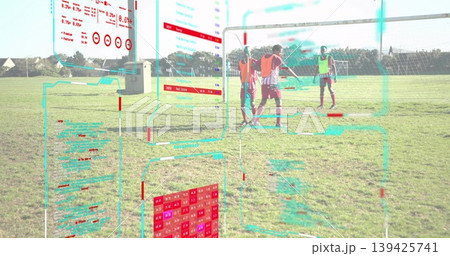 Gathering four soccer players wearing bibs near goalpost on pitch, showing HUD overlays, copy space 139425741