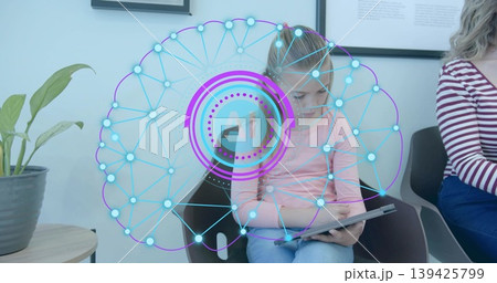 Sitting girl focusing on tablet in modern waiting area, with superimposed AI network graphic Sitting girl focusing on tablet in modern waiting area, with superimposed AI network graphic 139425799