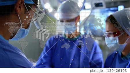 Surgeons in scrubs performing surgery at operating table, with instruments and digital map overlay Surgeons in scrubs performing surgery at operating table, with instruments and digital map overlay 139426198