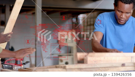 Operating man wearing blue t-shirt cutting plank at wood shop, with SYSTEM HACKED alert, copy space Operating man wearing blue t-shirt cutting plank at wood shop, with SYSTEM HACKED alert, copy space 139426356
