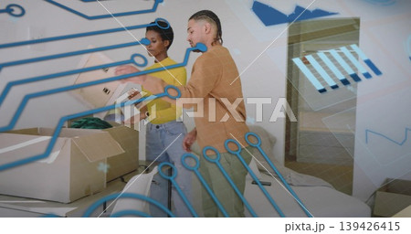 Unpacking moving couple sorting items from cardboard box in modern living room, with tech graphics Unpacking moving couple sorting items from cardboard box in modern living room, with tech graphics 139426415