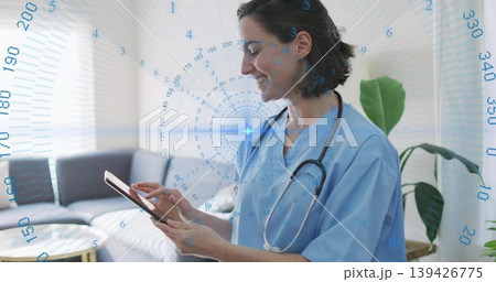 Smiling nurse in scrubs tapping tablet screen in living room with stethoscope overlay, copy space Smiling nurse in scrubs tapping tablet screen in living room with stethoscope overlay, copy space 139426775