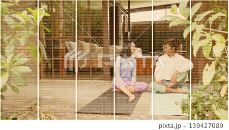Sitting two women in casual clothes barefoot, talking at home by sliding door with binary overlay Sitting two women in casual clothes barefoot, talking at home by sliding door with binary overlay 139427089