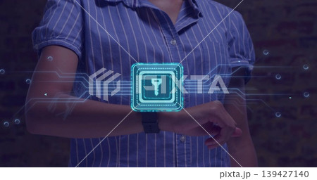 Extending female torso and arms wearing blue striped shirt in studio, using smartwatch holo key UI 139427140