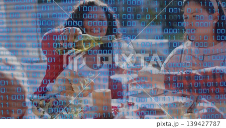 Pouring woman in red top filling champagne flutes at banquet, with flowers and binary overlay Pouring woman in red top filling champagne flutes at banquet, with flowers and binary overlay 139427787