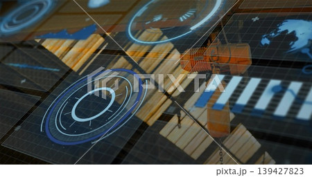 Highlighting orange crane hoist and hanging chain with holographic UI in warehouse, showing pallets Highlighting orange crane hoist and hanging chain with holographic UI in warehouse, showing pallets 139427823