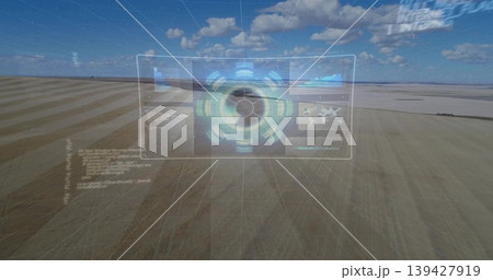 Floating holographic HUD displaying concentric hub and map panels over dry salt flat, grid overlay Floating holographic HUD displaying concentric hub and map panels over dry salt flat, grid overlay 139427919