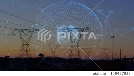 Silhouetting towers, lines and utility poles at dusk across rural corridor, with globe overlay Silhouetting towers, lines and utility poles at dusk across rural corridor, with globe overlay 139427922