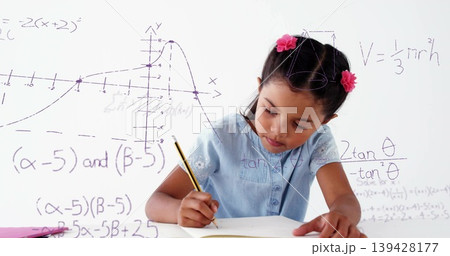 Blue-top pink-clips girl writing math in class using yellow-pencil notebook or whiteboard or purple- 139428177