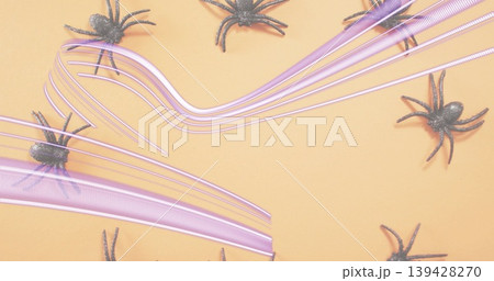 Sweeping translucent purple ribbons across peach paper, with black glitter spiders in shadows Sweeping translucent purple ribbons across peach paper, with black glitter spiders in shadows 139428270