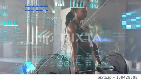 Lifting athlete in green sportswear deadlifting heavy barbell with data overlays at gym, copy space Lifting athlete in green sportswear deadlifting heavy barbell with data overlays at gym, copy space 139428388