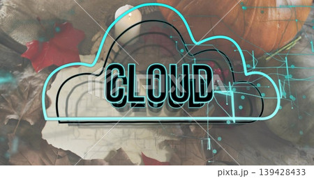 Showing neon cloud graphic labeled CLOUD on table, with pumpkin, dried leaves, candle, tech overlay 139428433
