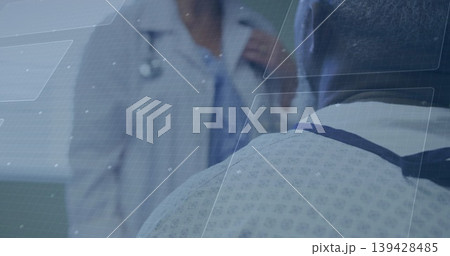 Sitting patient in patterned gown blue tie clinic, clinician lab coat stethoscope, HUD, copy space Sitting patient in patterned gown blue tie clinic, clinician lab coat stethoscope, HUD, copy space 139428485