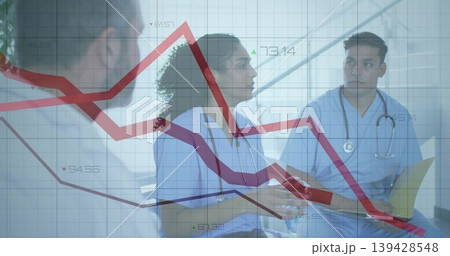 Talking clinician in scrubs with stethoscope gesturing and using tablet in clinic, chart overlay Talking clinician in scrubs with stethoscope gesturing and using tablet in clinic, chart overlay 139428548