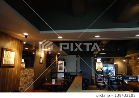 Modern Bar Interior with Brick Walls and Dartboard Modern Bar Interior with Brick Walls and Dartboard 139432185