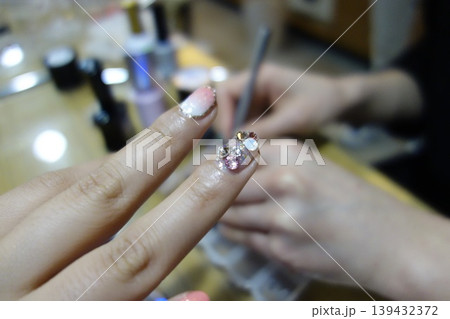 Close-up of Nail Art Application in Beauty Salon Close-up of Nail Art Application in Beauty Salon 139432372