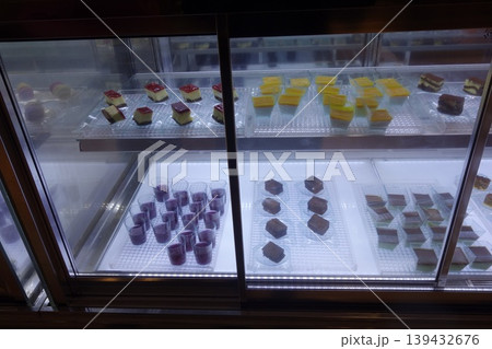 Dessert Display Case with Pastries and Cakes 139432676