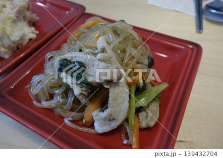 Chicken and Noodle Stir-Fry on Red Plate 139432704