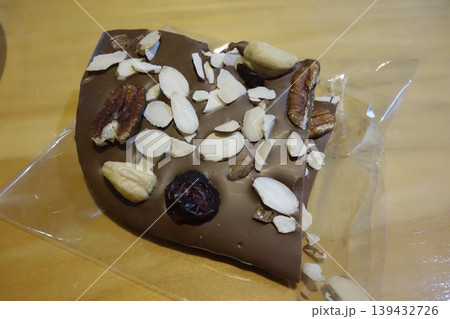 Chocolate Bar with Nuts and Dried Fruits Chocolate Bar with Nuts and Dried Fruits 139432726