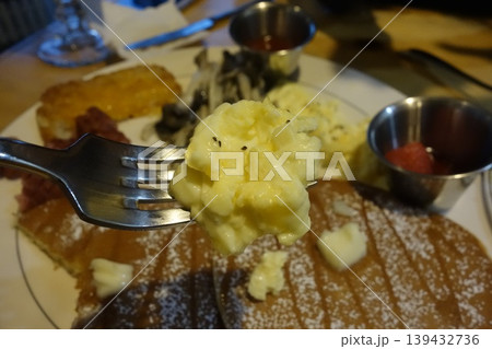 Fork with Mashed Potatoes and Breakfast Plate 139432736