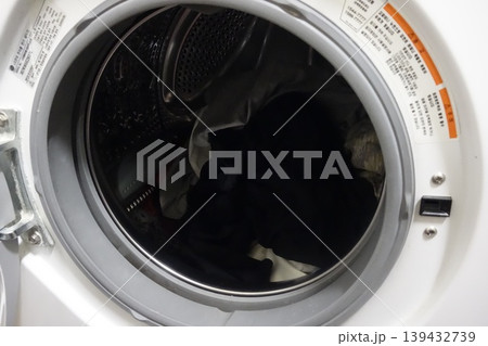 Washing Machine Interior with Laundry 139432739