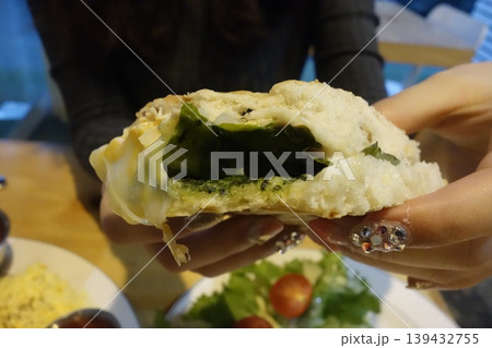 Close-up of Stuffed Bread with Greens and Cheese Close-up of Stuffed Bread with Greens and Cheese 139432755