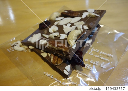 Deluxe Chocolate Bar with Nuts and Dried Fruits Deluxe Chocolate Bar with Nuts and Dried Fruits 139432757