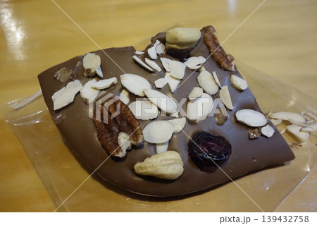 Chocolate Bar with Nuts and Dried Fruits Chocolate Bar with Nuts and Dried Fruits 139432758